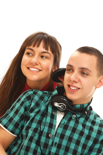 Happy friends listening to music — Stock Photo, Image