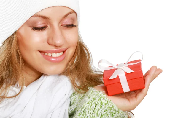 Beautiful woman holding gift — Stock Photo, Image