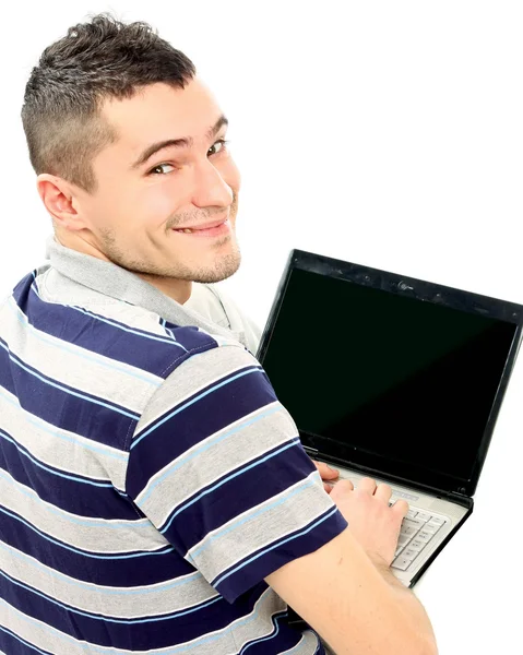 Man zittend op de vloer met een laptop — Stockfoto