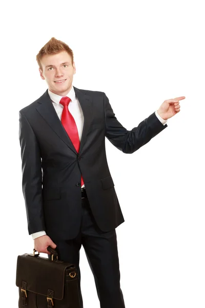 Portrait of a happy young man pointing — Stock Photo, Image