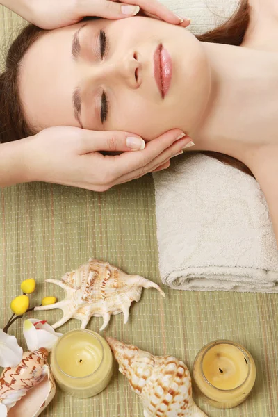 Young woman receiving massage — Stock Photo, Image
