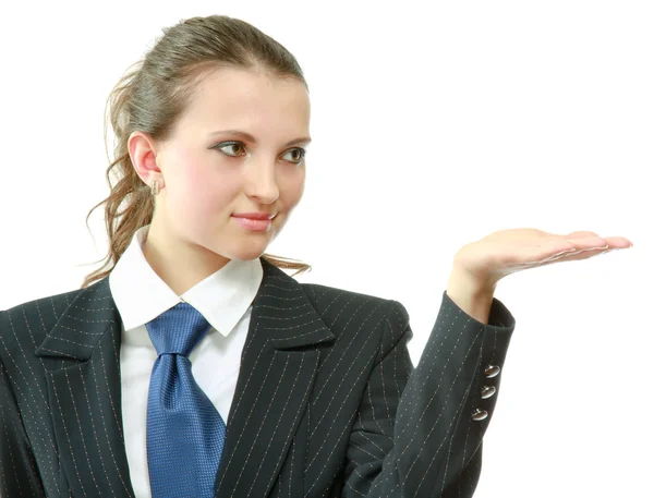 A young woman pointing at something — Stock Photo, Image