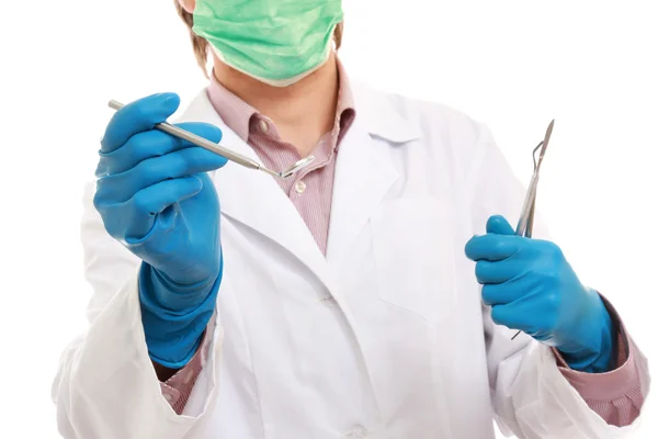 A male dentist with a toothbrush — Stock Photo, Image