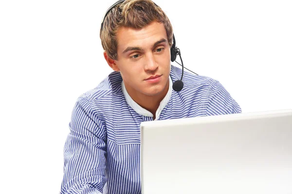 A portrait of a young man working on a laptop — Stock Photo, Image