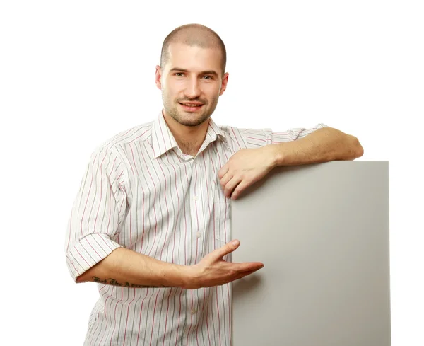 Hombre guapo con cartelera en blanco —  Fotos de Stock