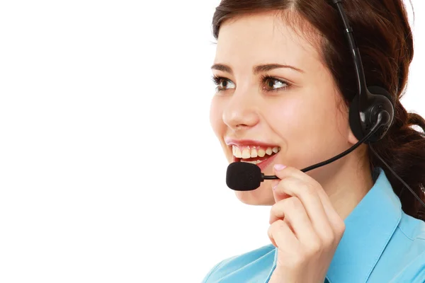 Ein junges Kundendienstmädchen mit einem Headset — Stockfoto