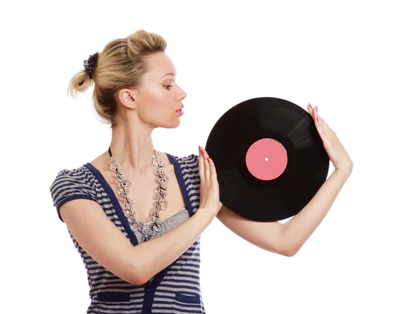 Una giovane donna con un disco in vinile — Foto Stock