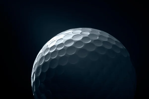 Um close-up de uma bola de golfe — Fotografia de Stock