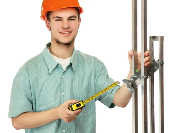 Un joven trabajador de la construcción — Foto de Stock