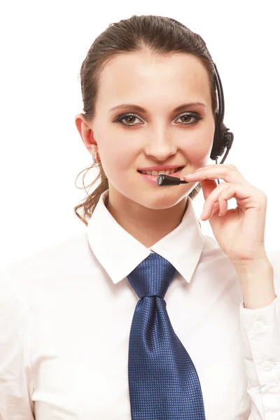 Uma jovem garota de atendimento ao cliente com um fone de ouvido — Fotografia de Stock