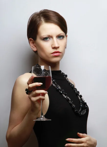 Donna con un bicchiere da vino — Foto Stock