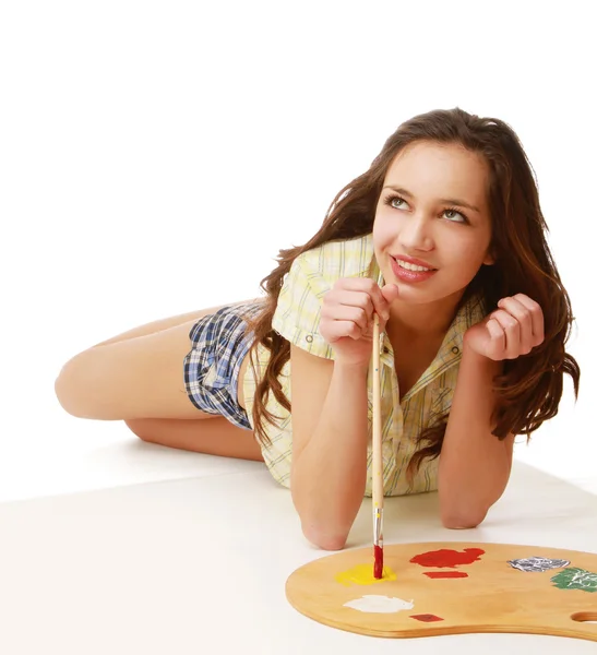 A young girl with a palette — Stock Photo, Image