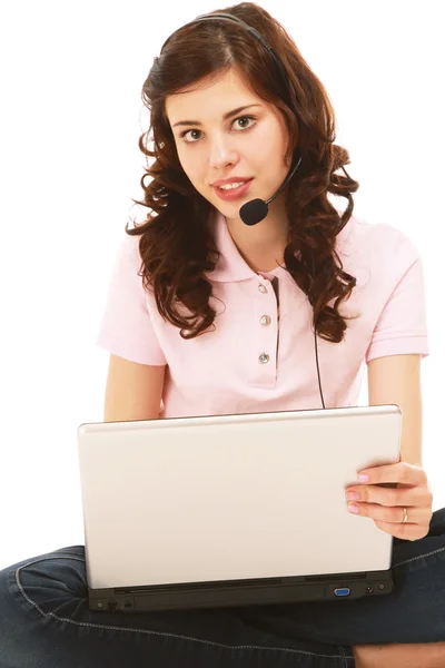 A young girl with a laptop and headphones — Stock Photo, Image