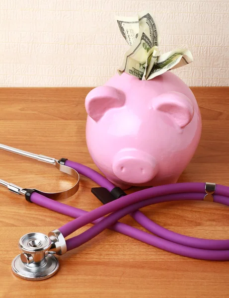 A piggy bank with dollars — Stock Photo, Image