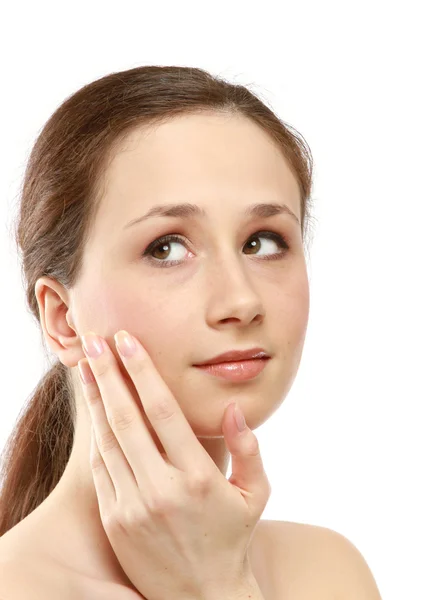 Young woman touching her face — Stock Photo, Image