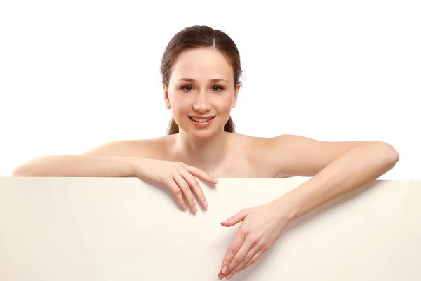 A young nude woman with a blank — Stock Photo, Image