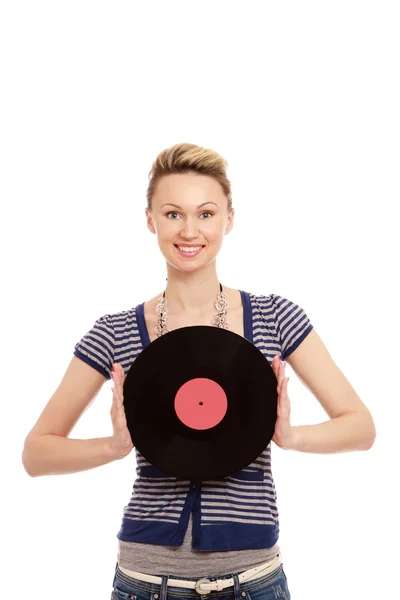 Une jeune femme avec un disque vinyle — Photo