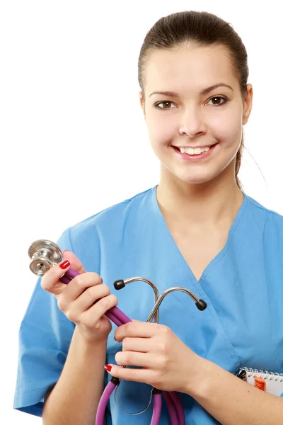 Una doctora con un estetoscopio escuchando — Foto de Stock