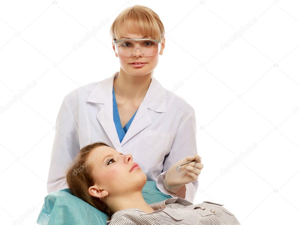 Examining patient's teeth