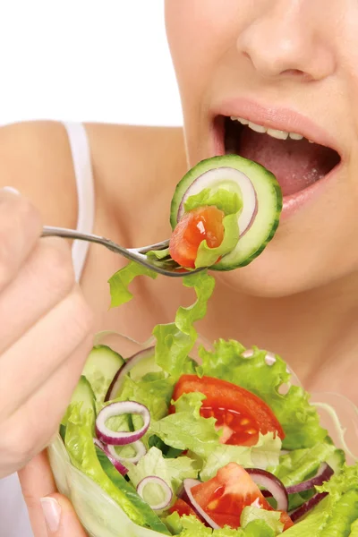 Woman is eating a salad — Stock Photo, Image