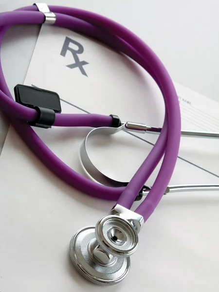 Closeup of a stethoscope on a rx prescription. — Stock Photo, Image