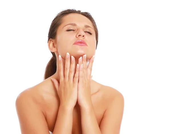 A beautiful woman touching her face — Stock Photo, Image