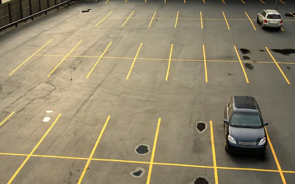 Aerial view of a parking lot with cars — Stock Photo, Image