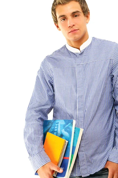Um jovem universitário com livros — Fotografia de Stock