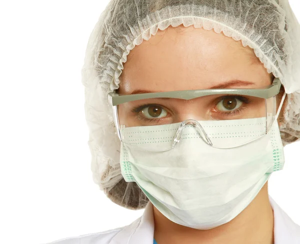 Женщина-врач в маске — стоковое фото