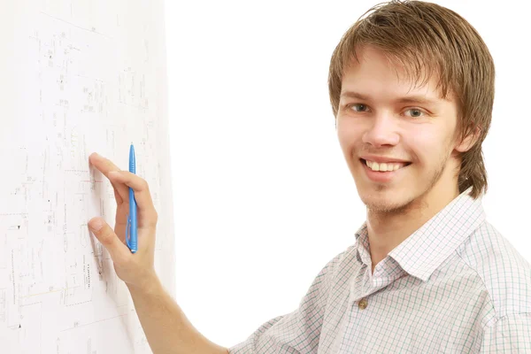 A young man near a diagram — Stock Photo, Image