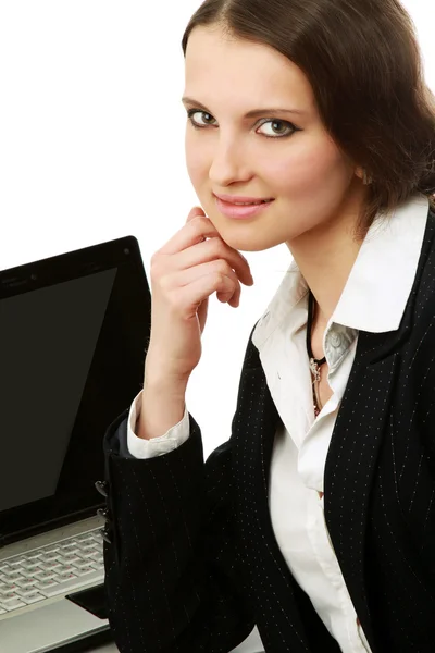 A young businesswoman in front of a laptop — Stock Photo, Image