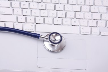 bir dokunmatik yüzey üzerinde mavi bir stetoskop