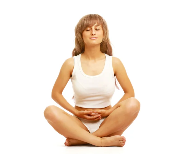 A lotus position in practise of yoga — Stock Photo, Image