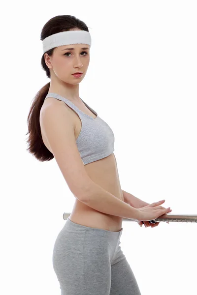 Young dancer standing near ballet bar — Stock Photo, Image