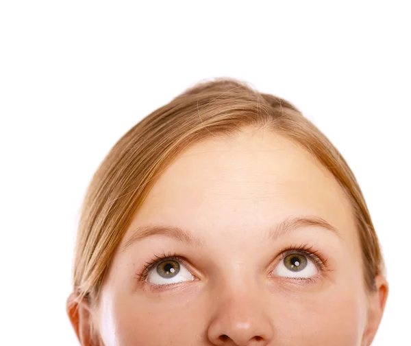 Młoda kobieta, patrząc na pół twarzy — Zdjęcie stockowe