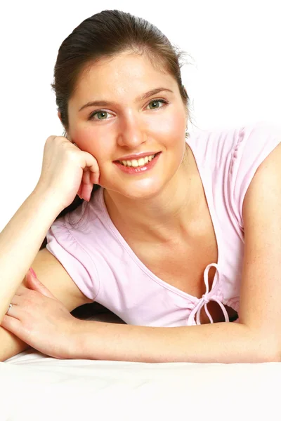 Close-up of happy girl lying on sofa — Stock Photo, Image