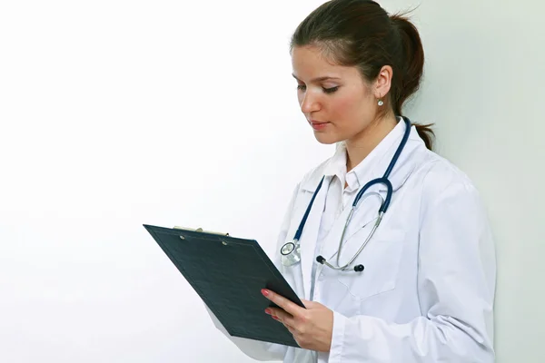 Young docotor with clipboard — Stock Photo, Image