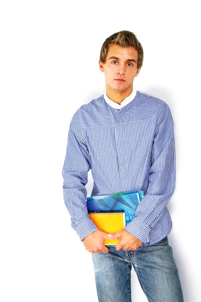 Un joven universitario con libros — Foto de Stock