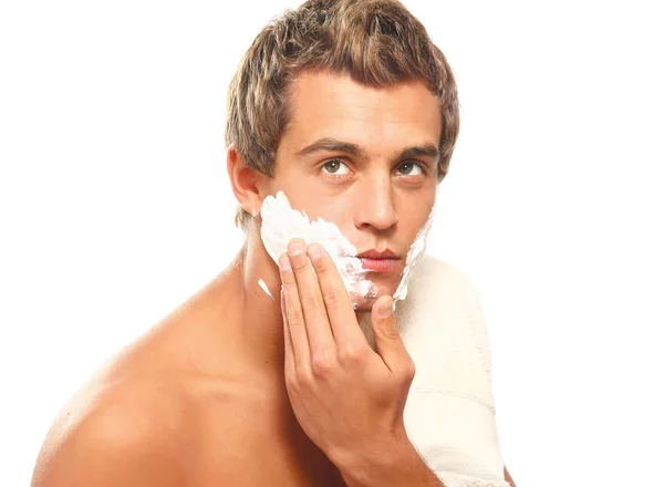 Closeup of a young man shaving — Stock Photo, Image