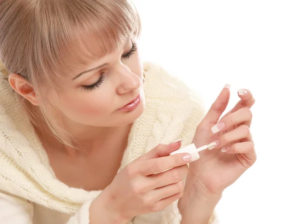 Una joven haciendo manicura — Foto de Stock