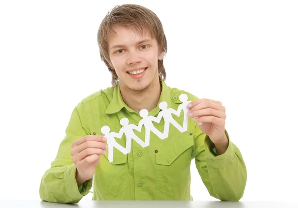 A young guy sitting at the desk — Stock Photo, Image