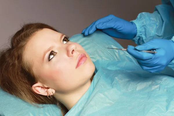 Woman receiving plastic operation — Stock Photo, Image