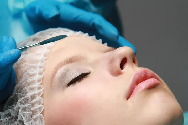 A woman receiving plastic operation — Stock Photo, Image