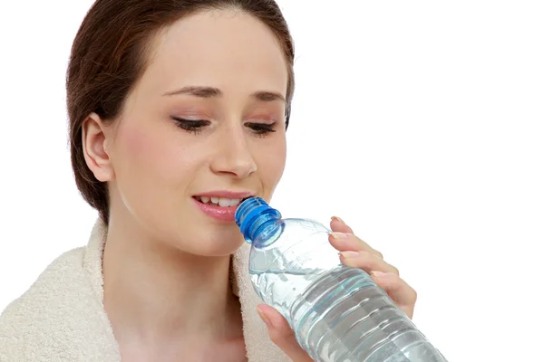 Mujer joven bebiendo agua Fotos de stock libres de derechos