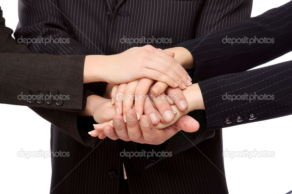 Hands of businesspeople together