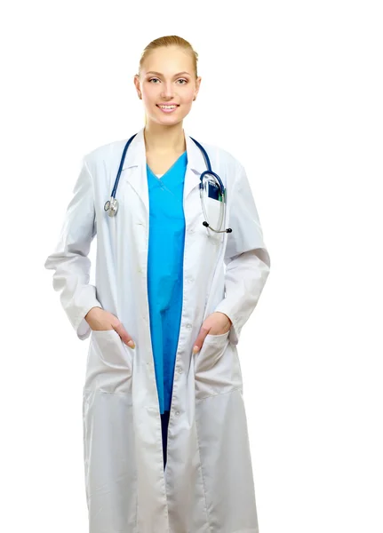 A female doctor with arms in pockets — Stock Photo, Image