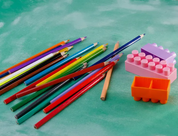 Pencil and mini construction blocks — Stock Photo, Image