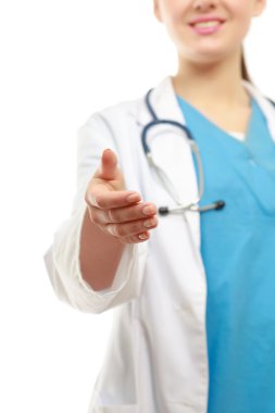 Beyaz arka plan üzerinde izole kadın doktorun karşılıklı.