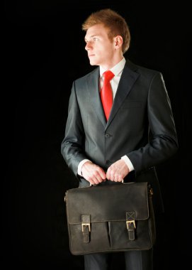 portret człowieka sukcesu w biznesie z torba.