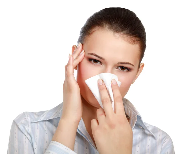Sick woman blowing her nose, white background. — Stock Photo, Image